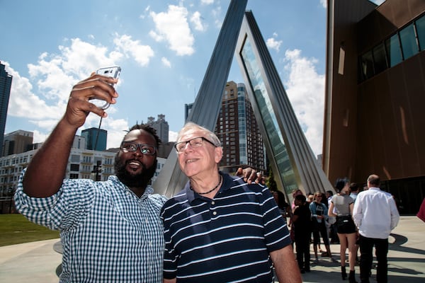 Dayvon Byers (left) a member of the Eagles Nest Church and Art Vander Veen, a member of the Roswell Community Church pose for a photo together before going into the National Center for Civil and Human Rights on Saturday, June 10, 2017. STEVE SCHAEFER / SPECIAL TO THE AJC