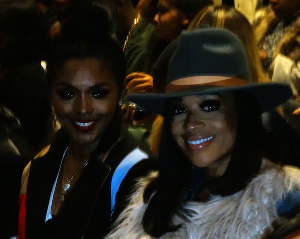 Rasheeda and Mimi in the audience. CREDIT: Rodney Ho/ rho@ajc.com