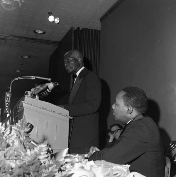 Martin Luther King, Jr. listens to Morehouse College President Benjamin E. Mays speak at the Nobel Peace Prize recognition dinner, National Conference of Christians and Jews,Dinkler Plaza Hotel, Atlanta, Georgia, January 27, 1965. LBSCB12-120iii, Lane Brothers Commercial Photographers Photographic Collection, 1920-1976. Special Collections and Archives, Georgia State University Library.