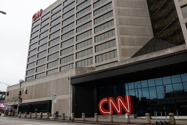 Fourteen stories, 1 million square feet, 35 shops, the world's tallest escalator, and, at one time containing a movie theater, a skating rink and an indoor amusement park, the CNN Center (which began life as the Omni Center) was the city's most remarkable enclosed space. It was an attempt, according to one architecture historian, to "out-Portman Portman." (Natrice Miller/The Atlanta Journal-Constitution/TNS)