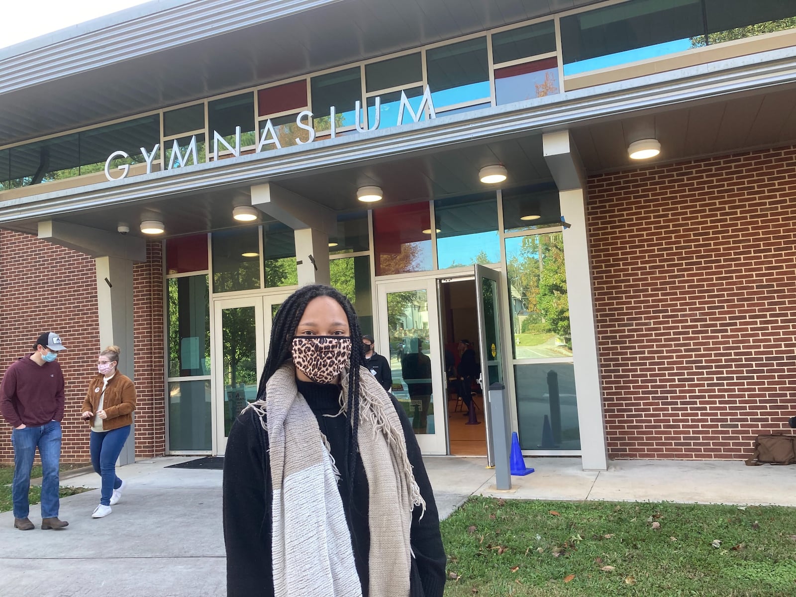 Kayla Willis, 26, approached Morris Brandon around 8:30 a.m. and was told she would have to vote on an emergency ballot, or come back later in the day. (J.D. Capelouto/AJC)