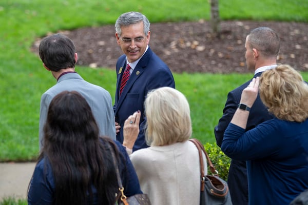 11/11/2020 —  Atlanta, Georgia — Georgia Secretary of State Brad Raffensperger speaks with Georgia county elections directors without a face mask following a press briefing outside of the Georgia State Capitol building in downtown Atlanta, Wednesday, November 11, 2020.  (Alyssa Pointer / Alyssa.Pointer@ajc.com)