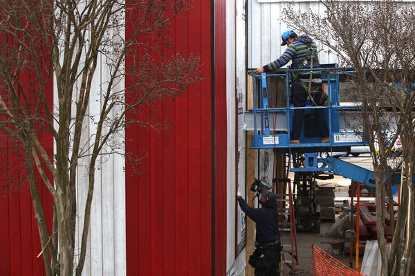 The Big Chicken got a fresh coat of paint Wednesday, March 22, 2017. Marietta's roadside icon at 12 Cobb Parkway is being renovated.