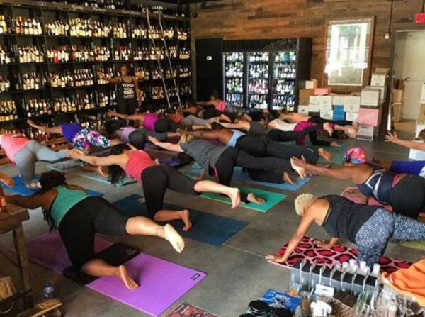 Partake in the Align + Wine Yoga class at VinoTeca, which finishes off with a wine tasting post-yoga session. CONTRIBUTED BY VINOTECA