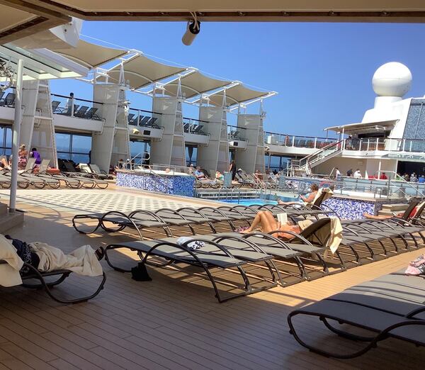 The largely empty pool deck of the Celebrity Eclipse cruise ship. SPECIAL to the AJC.