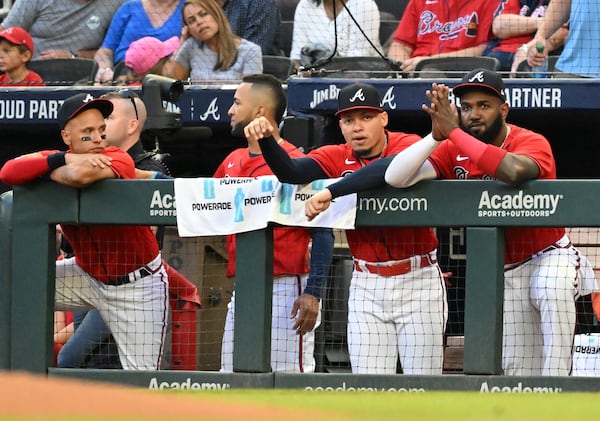 Braves' Marcell Ozuna (right) watches during the Atlanta Braves home game against Houston Astros at Truist Park on Friday, August 19, 2022. (Hyosub Shin / Hyosub.Shin@ajc.com)