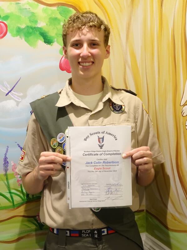 Colin Robertson, of Troop 7153, sponsored by St. Brigid Catholic Church,
whose project was the design and construction of 2 see-saws for the St. John Bosco Academy