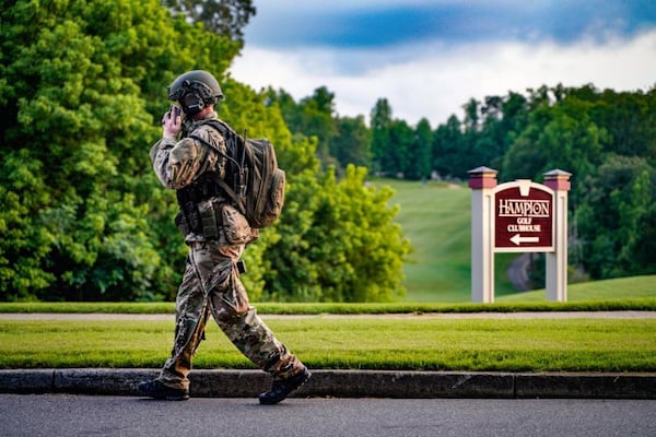 A nearly nine-hour SWAT standoff inside a Forsyth County neighborhood came to a peaceful end about 3:30 a.m. Friday.