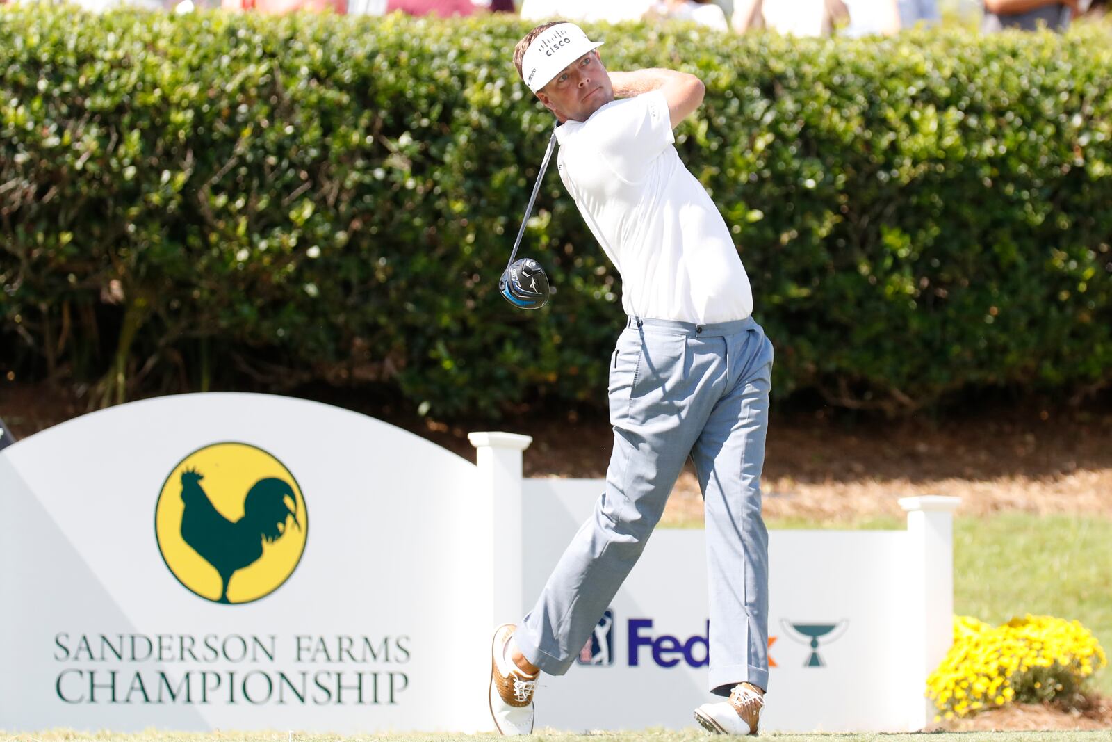 Keith Mitchell watches his ball fly after teeing off from the first hole during the fourth round of the 2024 Sanderson Farms Championship at the Country Club of Jackson on Oct. 06, 2024, in Jackson, Miss. (AP Photo/Sarah Warnock).