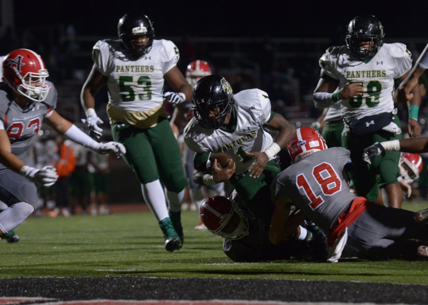 Photos: First round of high school football state playoffs