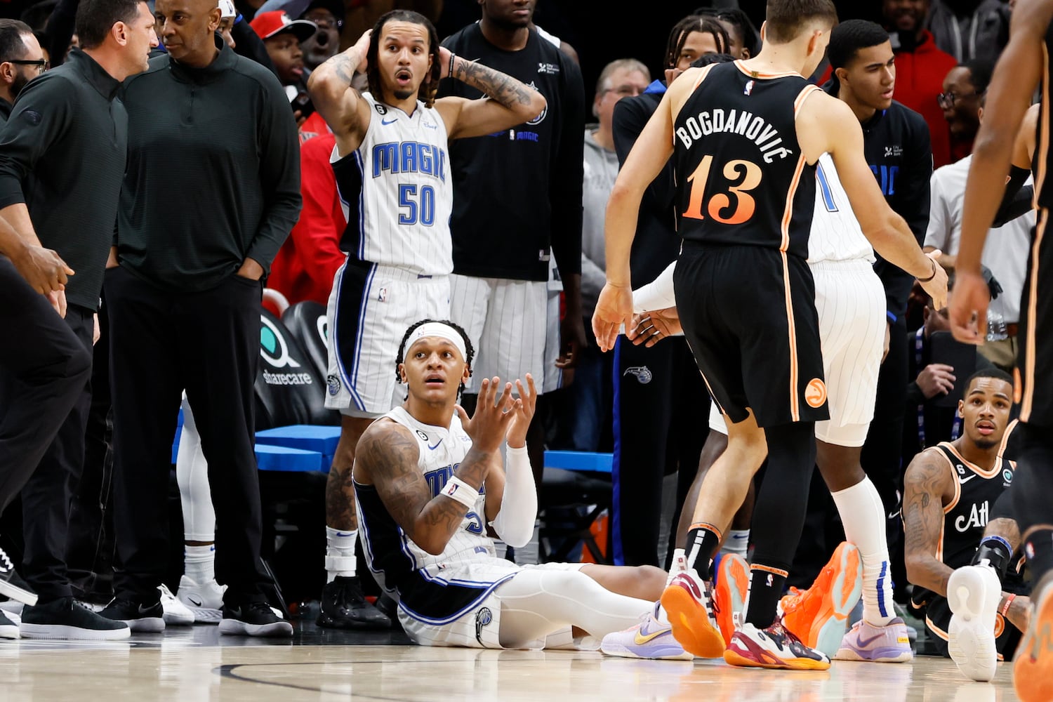 Magic forward Paolo Banchero reacts after fouling Hawks guard Dejounte Murray in the last second of the game Monday night in Atlanta. (Miguel Martinez / miguel.martinezjimenez@ajc.com)