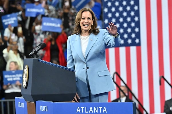 Vice President Kamala Harris waves as she walks on the stage at a rally at the Georgia State University’s convocation center in Atlanta on Tuesday, July 30, 2024.  It is her first campaign event in Georgia since she became the presumptive Democratic nominee. (Hyosub Shin / Hyosub.Shin / ajc.com)