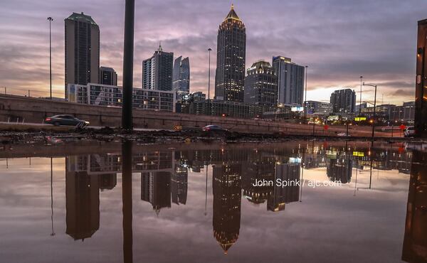 Atlanta roadways are dry Friday for the first time this week after four days of persistent rain. JOHN SPINK / JSPINK@AJC.COM