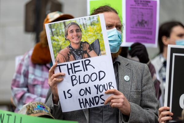 Demonstrators protest the construction of a new public safety training center during a press conference at City Hall in Atlanta on Tuesday, January 31, 2023. (Arvin Temkar / arvin.temkar@ajc.com)