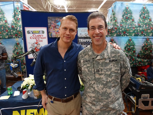 Investment advisor and weekend WSB talk show host Wes Moss joined Clark Howard on air Sunday morning at the Wal-Mart in Marietta. CREDIT: Rodney Ho/ rho@ajc.com