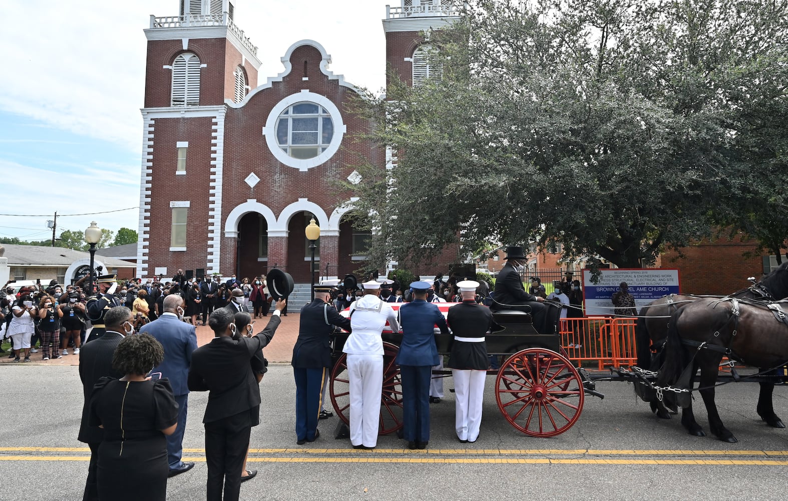 John Lewis crosses Edmund Pettus Bridge for final time