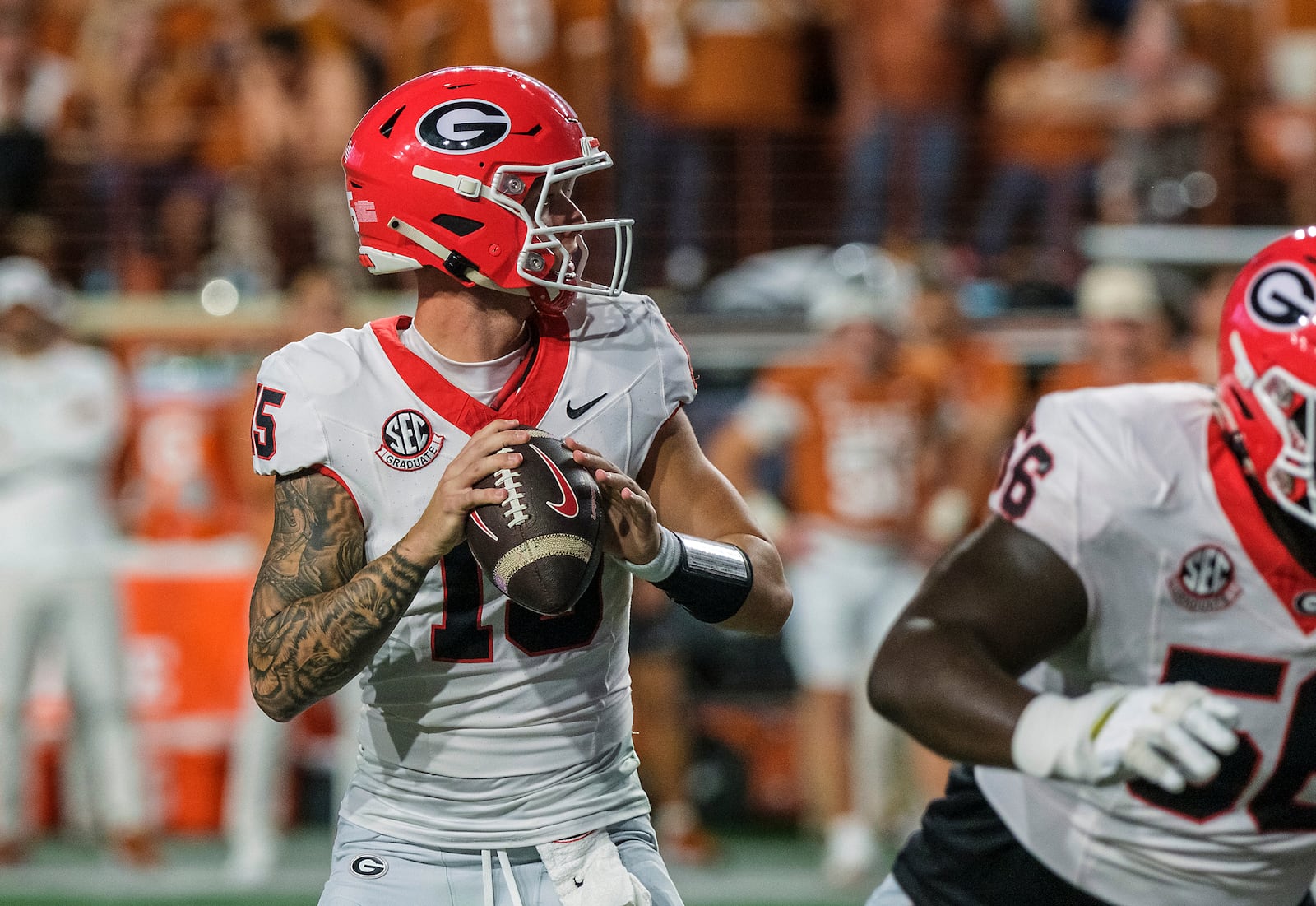 Georgia quarterback Carson Beck (15) looks downfield to pass against Texas during the first half of an NCAA college football game in Austin, Texas, Saturday, Oct. 19, 2024. (AP Photo/Rodolfo Gonzalez)