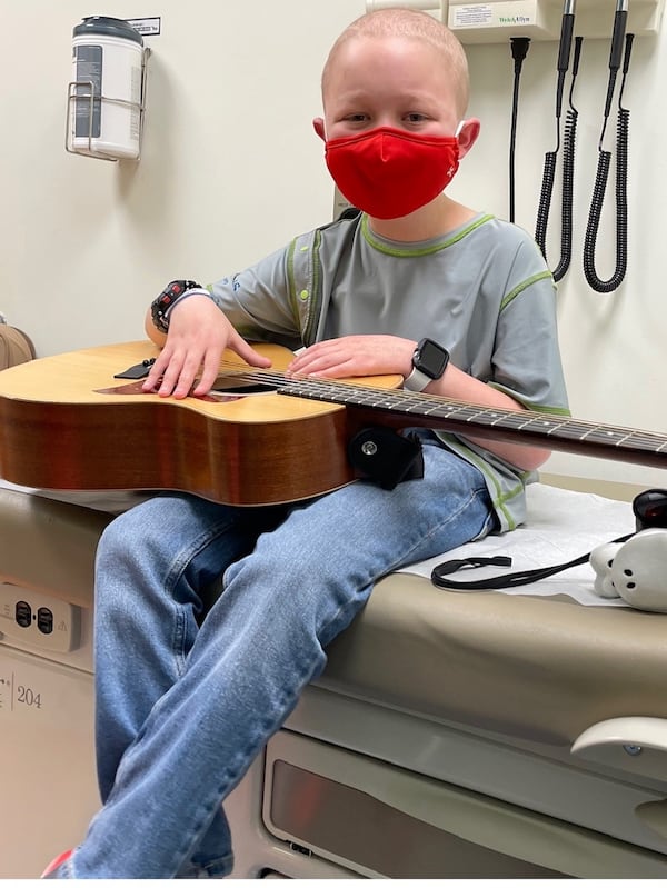 While undergoing chemotherapy treatments for acute lymphoblastic leukemia, Andrew Lawrence found comfort in learning how to play the guitar.
Photo courtesy of Chldren's Healthcare of Atlanta