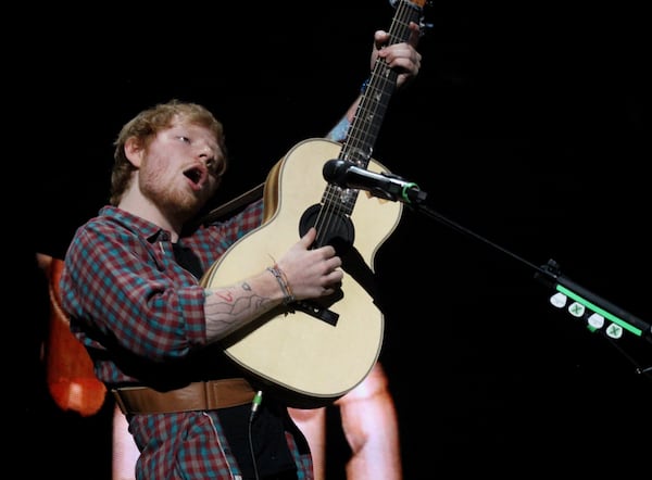 Sheeran has a deft touch with the guitar. Photo: Melissa Ruggieri/AJC