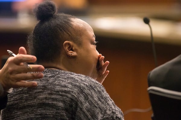 Erica White becomes emotional during her trail at Cobb County Superior Court, Monday, January 22, 2018. 