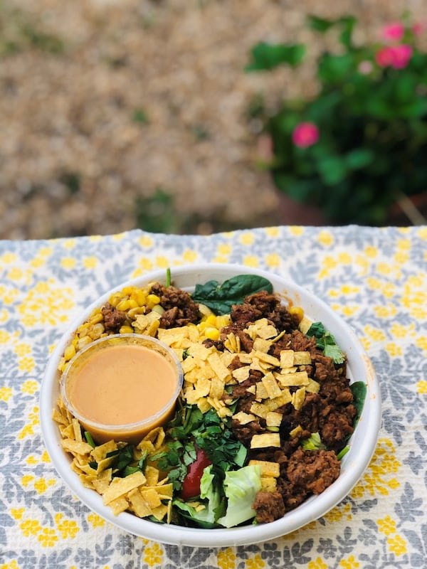 This taco bowl from Upbeet is made with seasoned ground Beyond Beef and crushed tortilla chips. CONTRIBUTED BY WENDELL BROCK