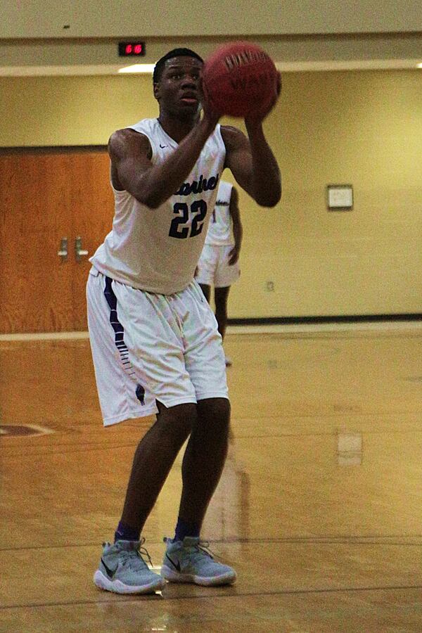  Miller Grove's Kevin Paige lines up free throw. (Photo -- Mark Brock)