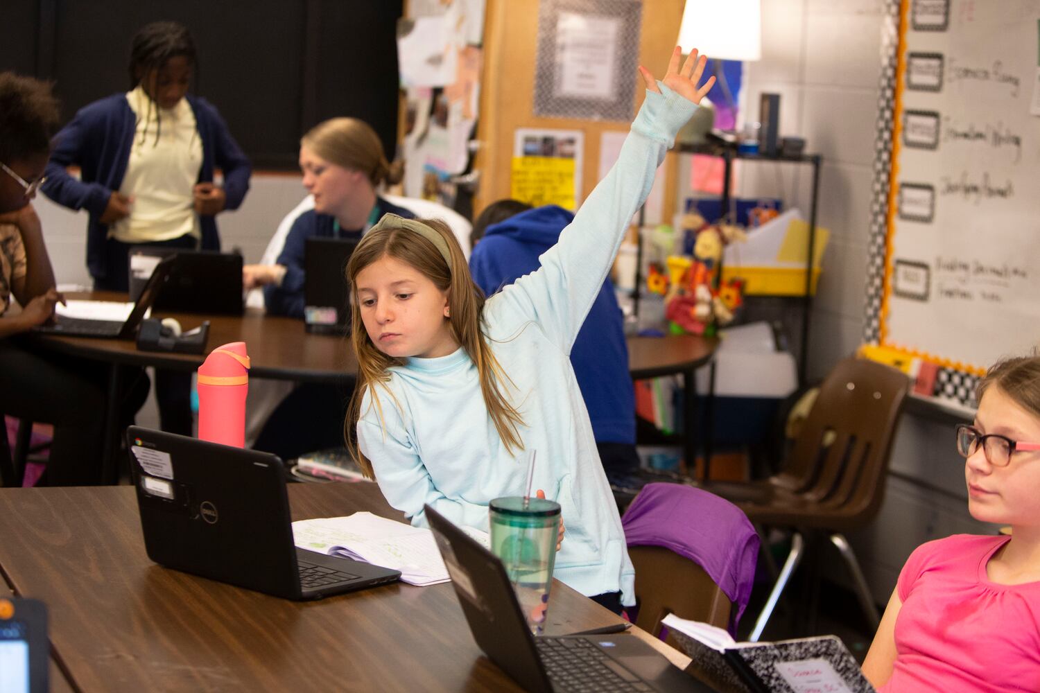 Penny Davis raises her hand during class on Wednesday, November 16, 2022, at Hickory Hills Elementary School in Marietta, Georgia. Marietta City Schools, like schools across the country, are working to overcome learning loss caused by the pandemic. CHRISTINA MATACOTTA FOR THE ATLANTA JOURNAL-CONSTITUTION