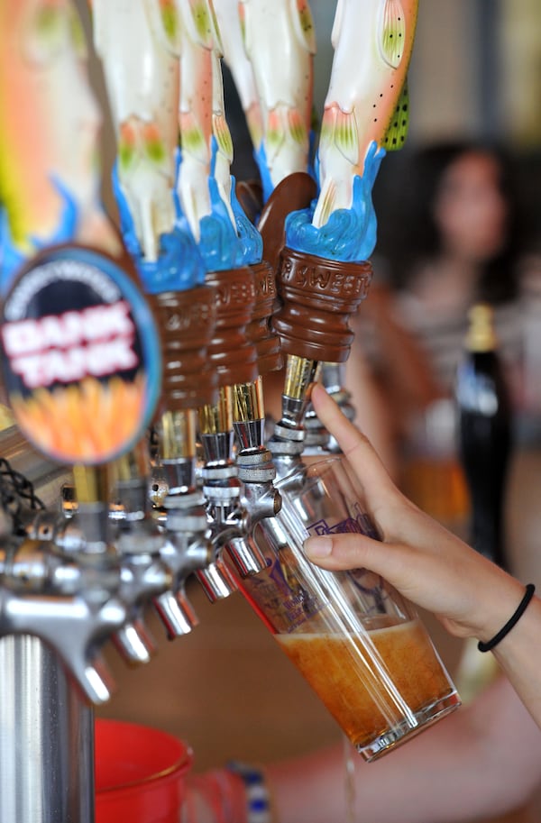 SweetWater is one of the local breweries represented at Mercedes-Benz Stadium. HYOSUB SHIN / AJC FILE