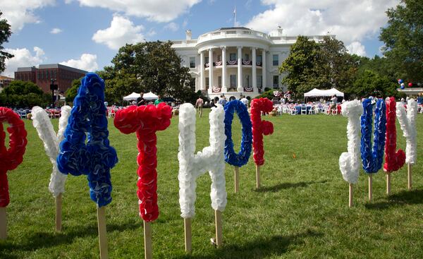 FILE - In this July 4, 2013 file photo, The White House is adorned in preparation for the a Fourth of July celebration on the South Lawn of the White House in Washington.  The White House is adding a live concert on the South Lawn to its annual Fourth of July celebration. (AP Photo/Manuel Balce Ceneta)