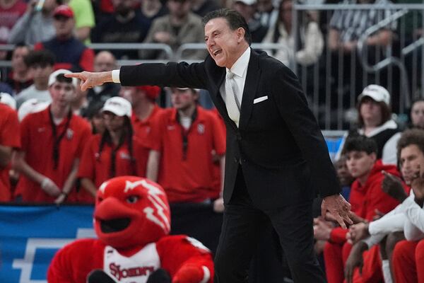 St. John's head coach Rick Pitino calls to his players during the first half in the first round of the NCAA college basketball tournament, Thursday, March 20, 2025, in Providence, R.I. (AP Photo/Charles Krupa)