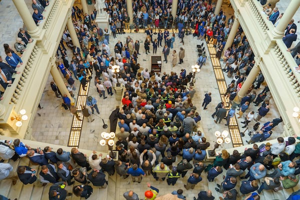 Crowds of people fill the north steps of the Georgia State Capitol to hear Gov. Brian Kemp speak about civil litigation changes on Jan. 30, 2025 in Atlanta. Matthew Pearson/WABE/AP FILE