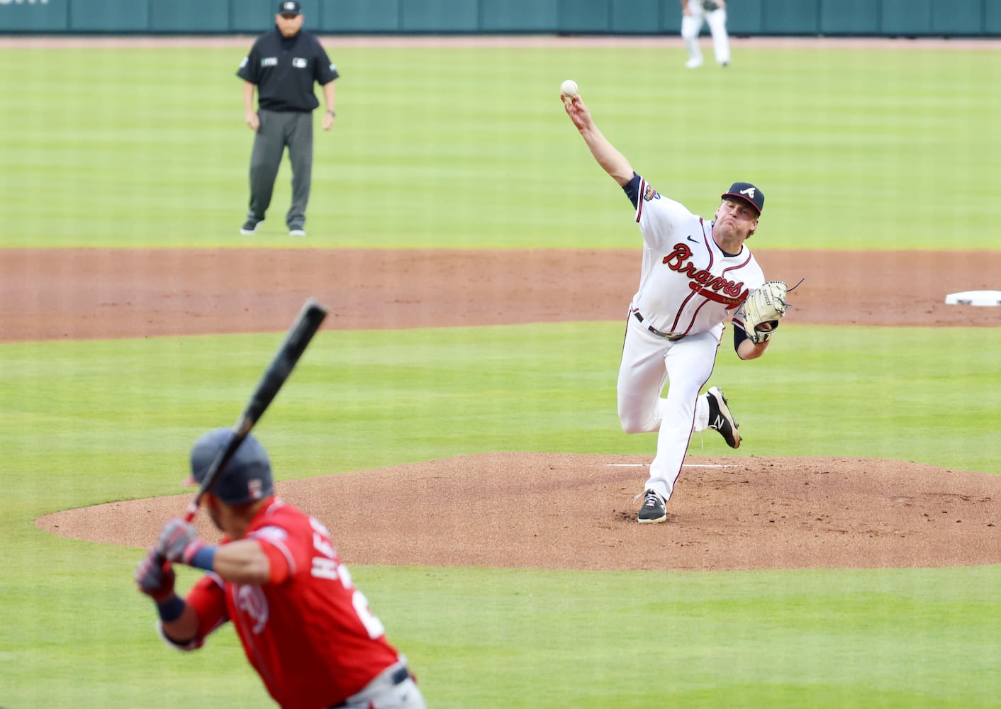 Atlanta Braves starting pitcher Bryce Elder (55) works in the first inning of a baseball game on his MLB debut against the Washington Nationals at Truist Park on Tuesday, April 12, 2022 