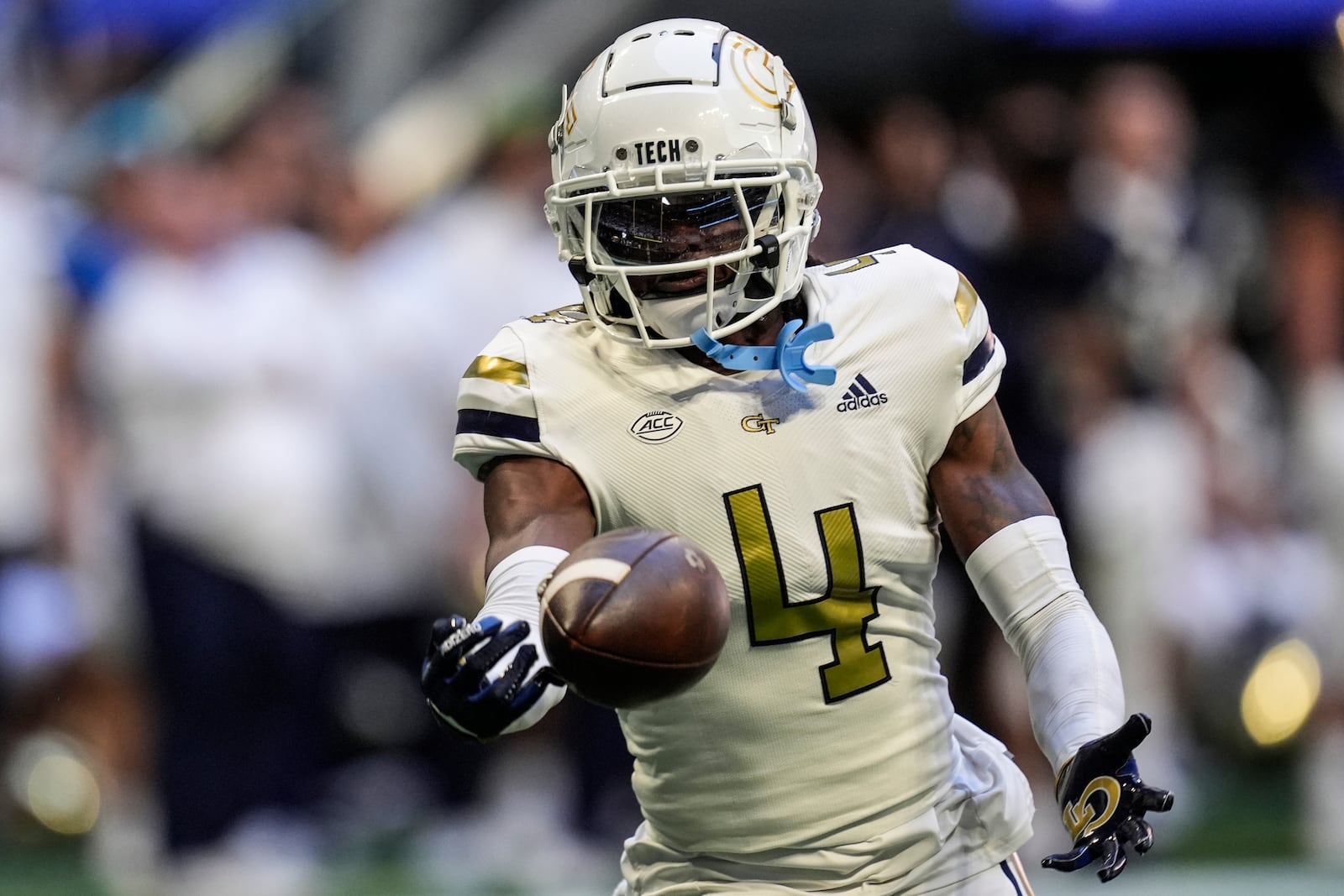 Georgia Tech defensive back Warren Burrell (4) intercepts the ball off Notre Dame quarterback Riley Leonard during the first half of an NCAA college football game, Saturday, Oct. 19, 2024, in Atlanta. (AP Photo/Mike Stewart)