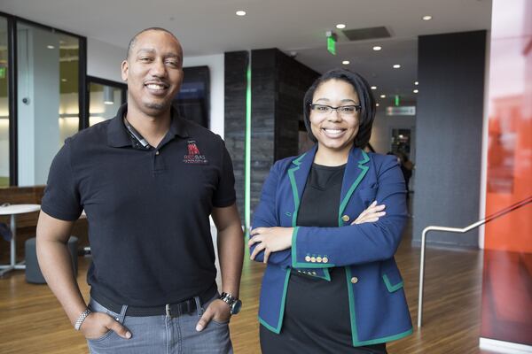 U.S. Army veteran John Thomas and U.S. Air Force veteran Judith Taylor, shown at Atlanta Tech Village, are part of RedBag Gifts, which allows its patrons to choose from local services and goods to present to their loved ones. Thomas is CEO and founder of RedBag Gifts, and Taylor is the product manager of the company. ALYSSA POINTER/ALYSSA.POINTER@AJC.COM