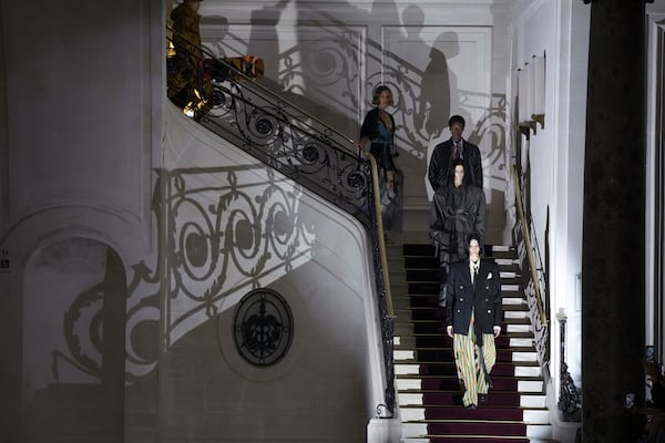 Models wear creations as part of the Vivienne Westwood Fall/Winter 2025-2026 Womenswear collection presented in Paris, Saturday, March 8, 2025. (Photo by Scott A Garfitt/Invision/AP)