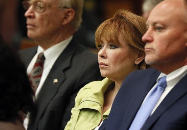 Dani Jo Carter sits in the audience during the Tex McIver murder trial at the Fulton County Courthouse on Thursday, April 12, 2018. (Bob Andres bandres@ajc.com)