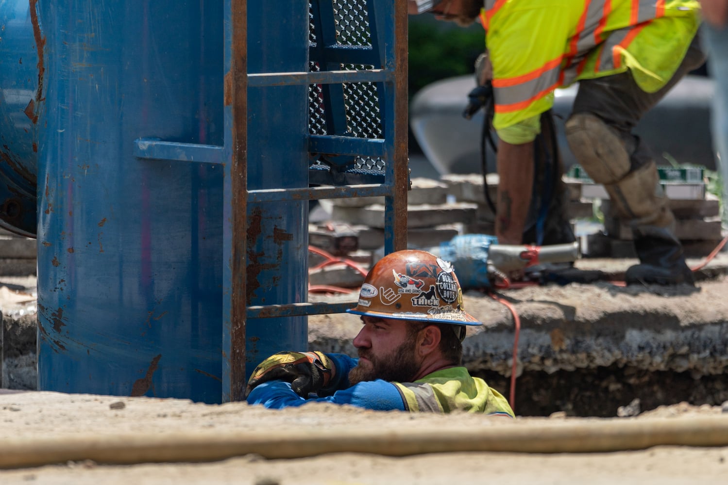 Water continues to flood out of the broken water main