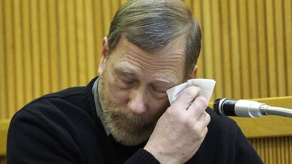 Michael Stern, the father of murder victim Sarah Stern, 19, of Neptune City, N.J., wipes tears from his eyes as he testifies for the prosecution Feb. 5, 2019, during the trial of 21-year-old Liam McAtasney at the Monmouth County courthouse in Freehold, N.J. McAtasney, a childhood friend of Sarah's, was convicted Tuesday, Feb. 26, 2019, of strangling the victim over money Dec. 2, 2016, and throwing her body off a bridge. Sarah Stern's remains have never been found.