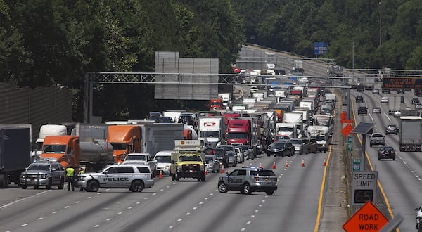 A chain-reaction wreck in the eastbound lanes of I-285 in Dunwoody brought traffic to a standstill Friday morning.