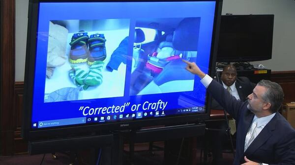 Defense attorney Maddox Kilgore attacks the accuracy of the state's 3-D recreation of the SUV scene, during his closing argument in the murder trial of Justin Ross Harris at the Glynn County Courthouse in Brunswick, Ga., on Monday, Nov. 7, 2016. (screen capture via WSB-TV)