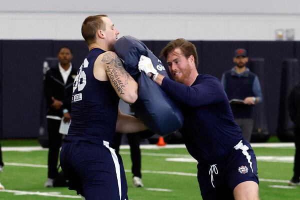 Auburn tight ends Luke Deal (86) and Georgia Southern's Tyler Fromm run through drills during Auburn's Pro Day, Monday, March 24, 2025, in Auburn, Ala. (AP Photo/Butch Dill)