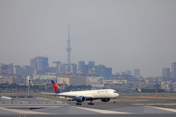 A Delta plane sits on the runway at Haneda Airport in Tokyo. (Delta 2022)