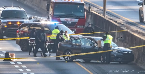 A double shooting in the southbound lanes of I-85 in Midtown Atlanta left one man dead and wreaked havoc on the commute on Feb, 10, 2021. (JOHN SPINK / John.Spink@ajc.com)


