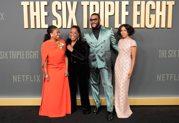 Producer Nicole Avant (left), cast member Oprah Winfrey, writer-director-producer Tyler Perry and cast member Kerry Washington at the Dec. 3 premiere of the Netflix film "The Six Triple Eight" at the Egyptian Theatre Hollywood in Los Angeles. 