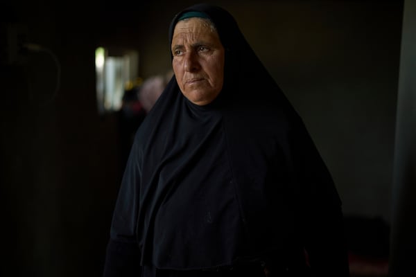 Hamdi Ballal, mother of Hamdan Ballal, a Palestinian co-director of the Oscar winner documentary "No Other Land", who was attacked by Jewish settlers before being detained by the Israeli army, looks on in their house in the village of Susiya in Masafer Yatta, south Hebron hills Tuesday, March 25, 2025. (AP Photo/Leo Correa)