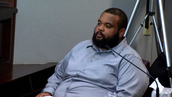 Jelani Etienne, who worked with Justin Ross Harris at Home Depot, testifies at Harris' murder trial at the Glynn County Courthouse in Brunswick, Ga., on Tuesday, Nov. 1, 2016. Etienne described how Harris would talk proudly of Cooper. (screen capture via WSB-TV)