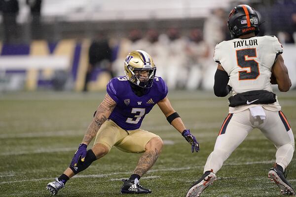 Washington defensive back Elijah Molden in action against Oregon State Saturday, Nov. 14, 2020, in Seattle. (Ted S. Warren/AP)