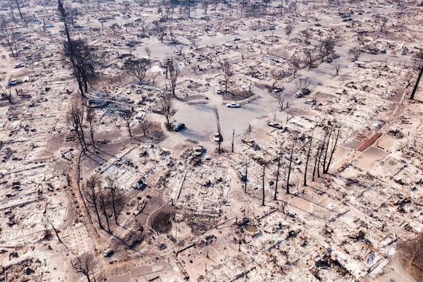 Fire damage is seen from the air in the Coffey Park neighborhood October 11, 2017, in Santa Rosa, California
More than 200 fire engines and firefighting crews from around the country were being rushed to California on Wednesday to help battle infernos which have left at least 21 people dead and thousands homeless. (ELIJAH NOUVELAGE/AFP/Getty Images)