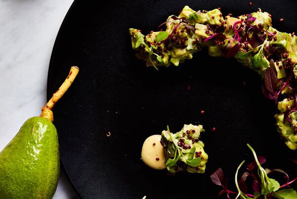 Avocado, sesame oil, and yuzu tartar, puffed red quinoa at Chez L’ Epicier. (Photo by LibbyVision.com)