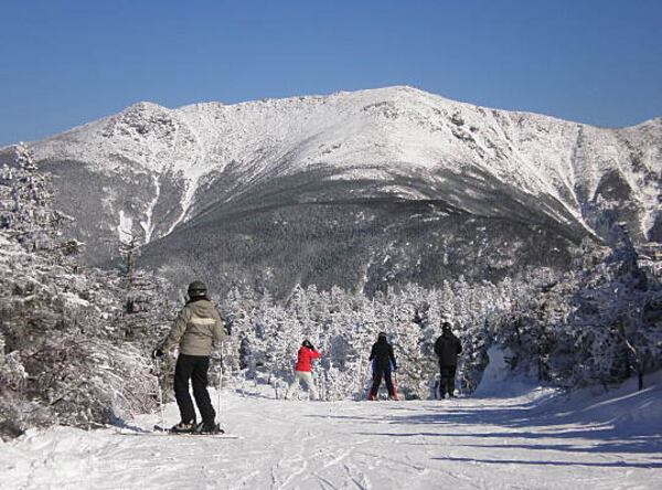 Skiers enjoying Cannon Mountains slopes